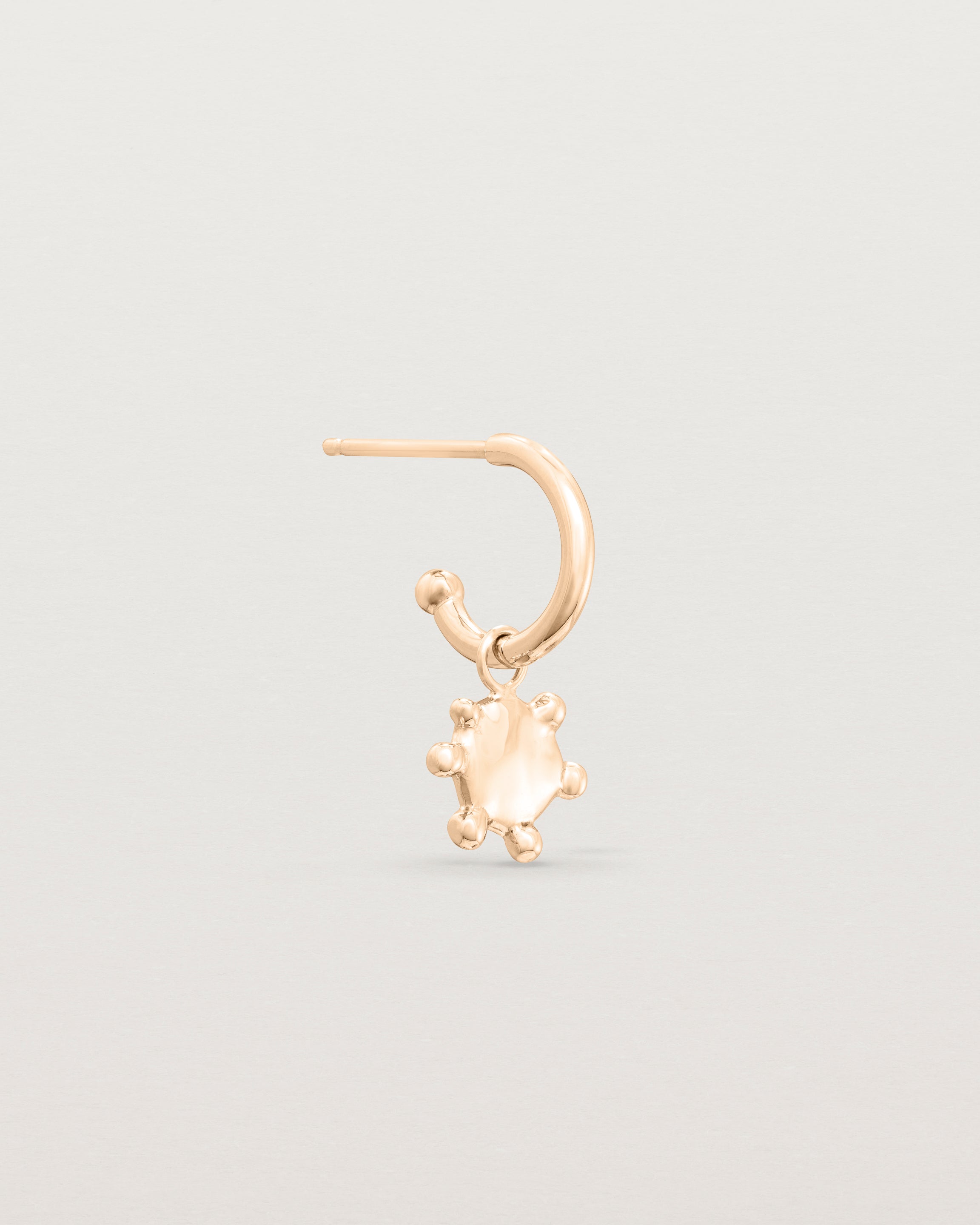 Single Dotted Mana Hoop in rose gold.