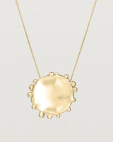 Close up of the Dotted Mana Necklace in yellow gold