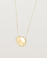 Angled view of the Dotted Mana Necklace in Yellow Gold