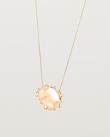 Angled view of the Dotted Mana Necklace in Rose Gold