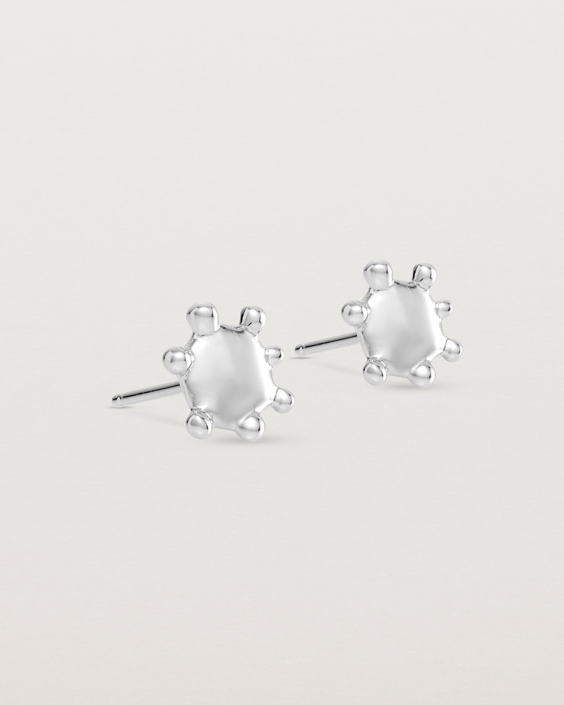 Angled view of the Dotted Mana Studs in sterling silver.