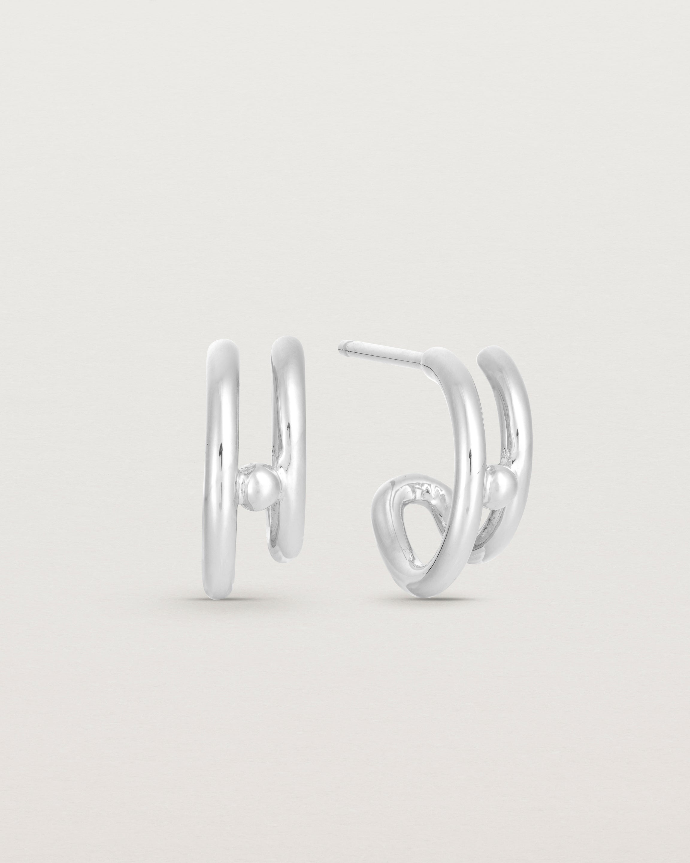 A pair of Double Reliquum Hoops in white gold.