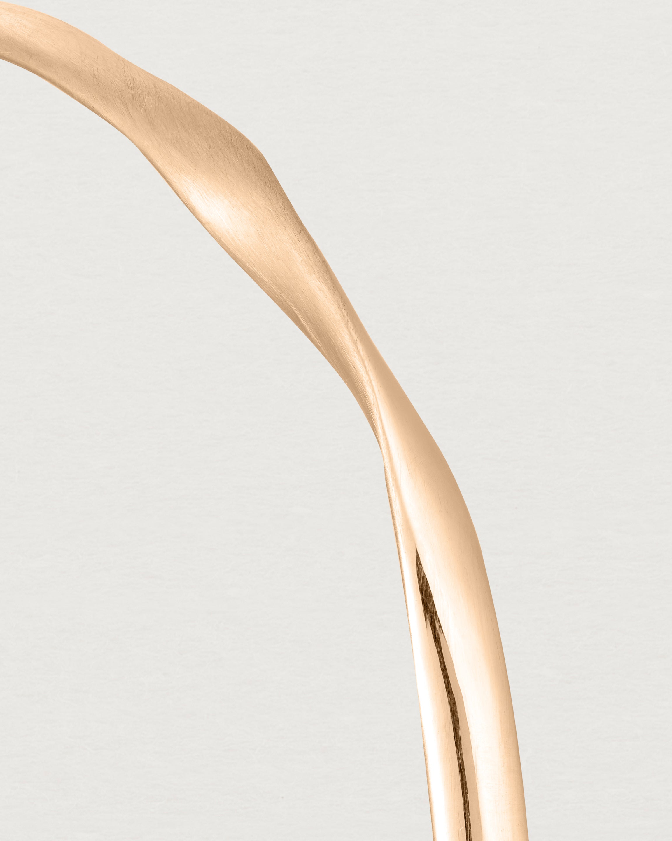 close up view of the ellipse bangle in rose gold