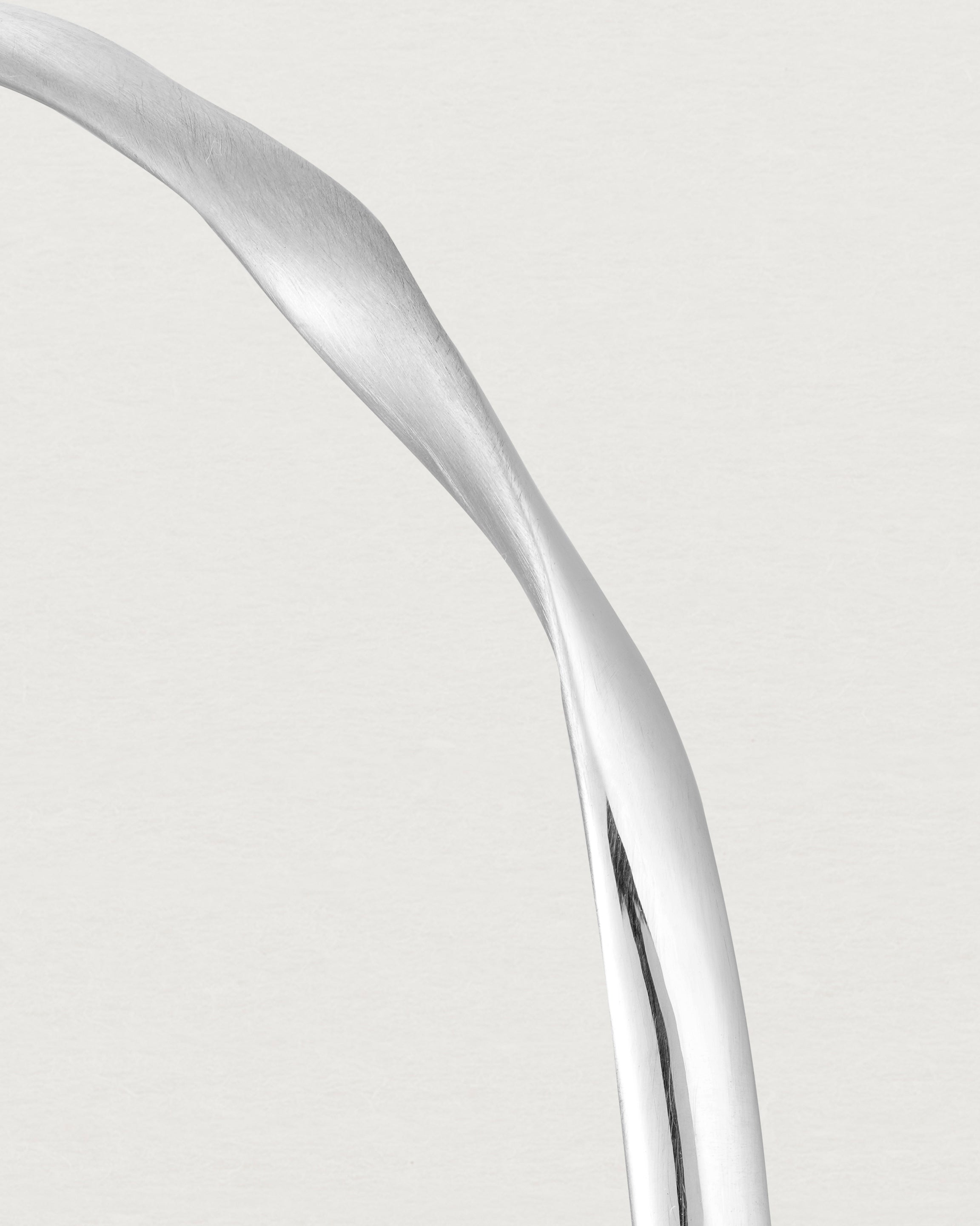 close up  of the ellipse bangle in sterling silver