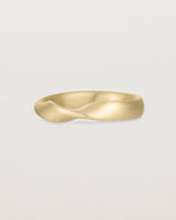 Angled view of the Ellipse / Shift Ring in Yellow Gold.