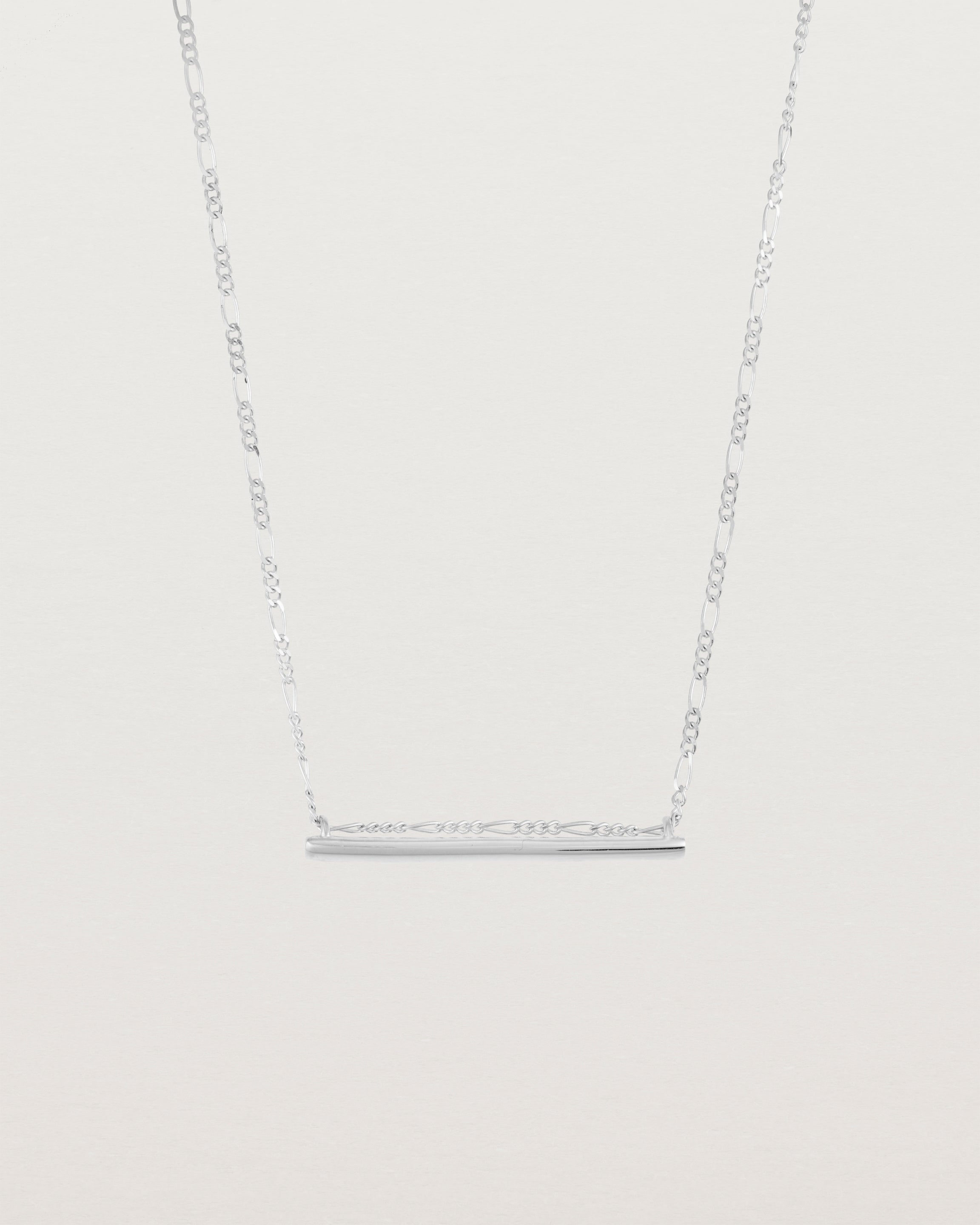 Ellipse necklace with a silver bar hanging from a chain in sterling silver