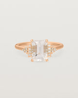 Front view of the Elodie Ring featuring a pale pink emerald cut morganite in rose gold