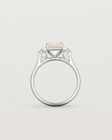 Standing view of the Elodie Ring featuring a pale pink emerald cut morganite in white gold
