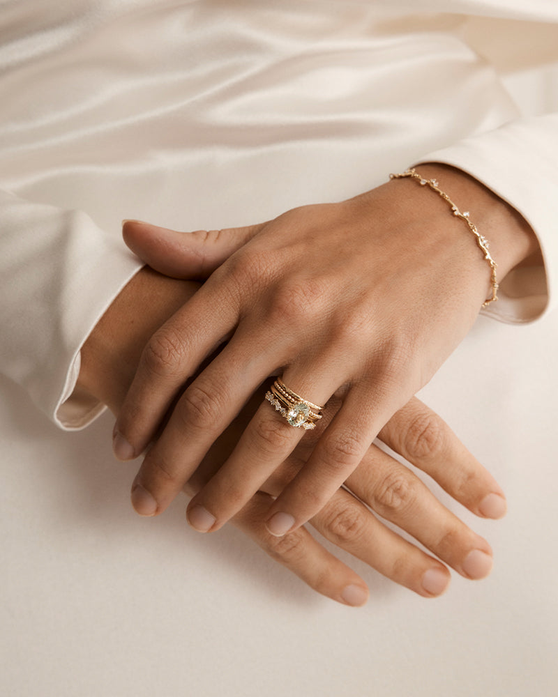 photo of the Elora ring stacked on a models hand