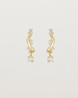 front image of diamond drop ember earrings in yellow gold.