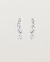 front image of diamond drop ember earrings in white gold.