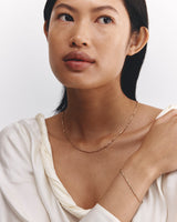 Model wearing ember bracelet in yellow gold