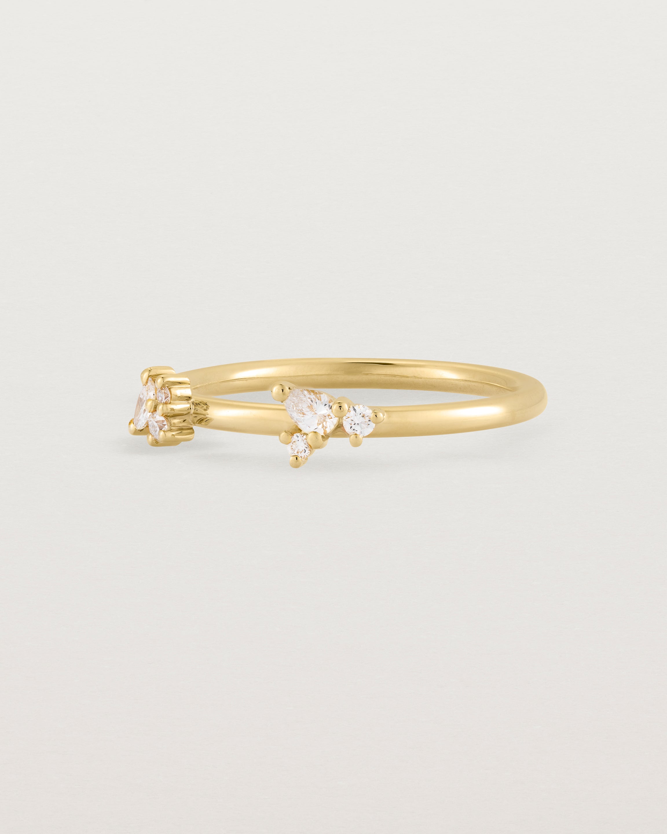 Angled view of the Etta Cluster Ring | Diamonds in Yellow Gold.