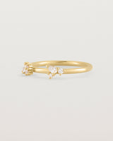 Angled view of the Etta Cluster Ring | Diamonds in Yellow Gold.