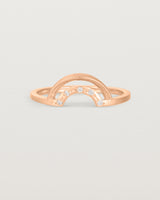 A double arc crown ring with white diamonds adoring the inner arc - crafted in rose gold. 