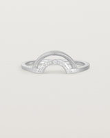 A double arc crown ring with white diamonds adoring the inner arc - crafted in white gold. 