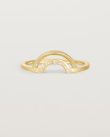 A double arc crown ring with white diamonds adoring the inner arc - crafted in yellow gold. 