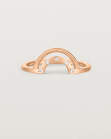 Fit two of a double arc crown ring with white diamonds adoring the inner arc - crafted in rose gold. 