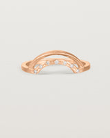 Fit three of a double arc crown ring with white diamonds adoring the inner arc - crafted in rose gold.