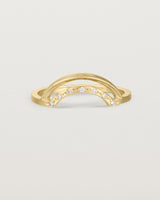 Fit three of a double arc crown ring with white diamonds adoring the inner arc - crafted in yellow gold.