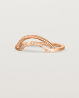 Fit four of a double arc crown ring with white diamonds adoring the inner arc - crafted in rose gold.