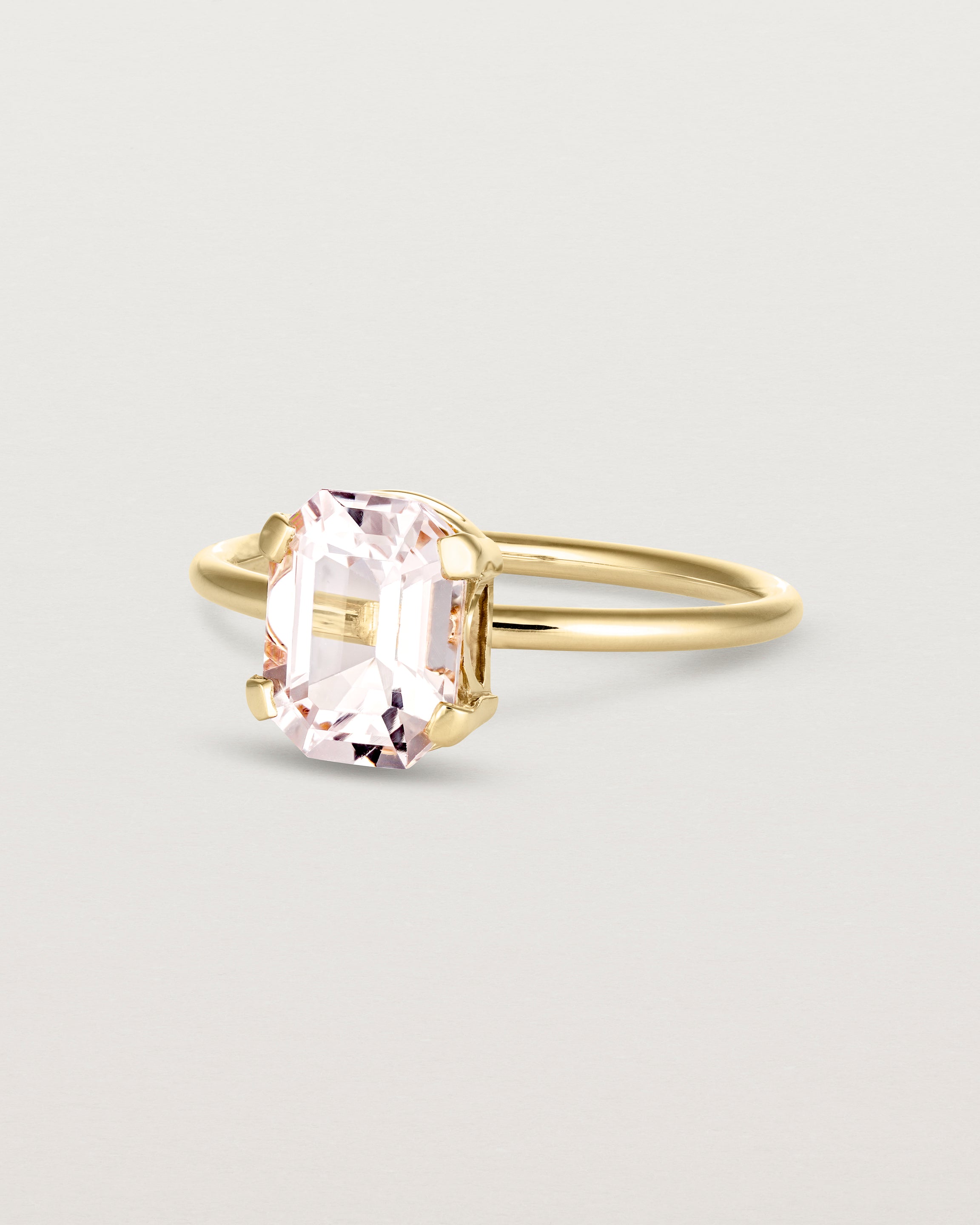 Angled view of the Fei Ring | Morganite yellow gold.