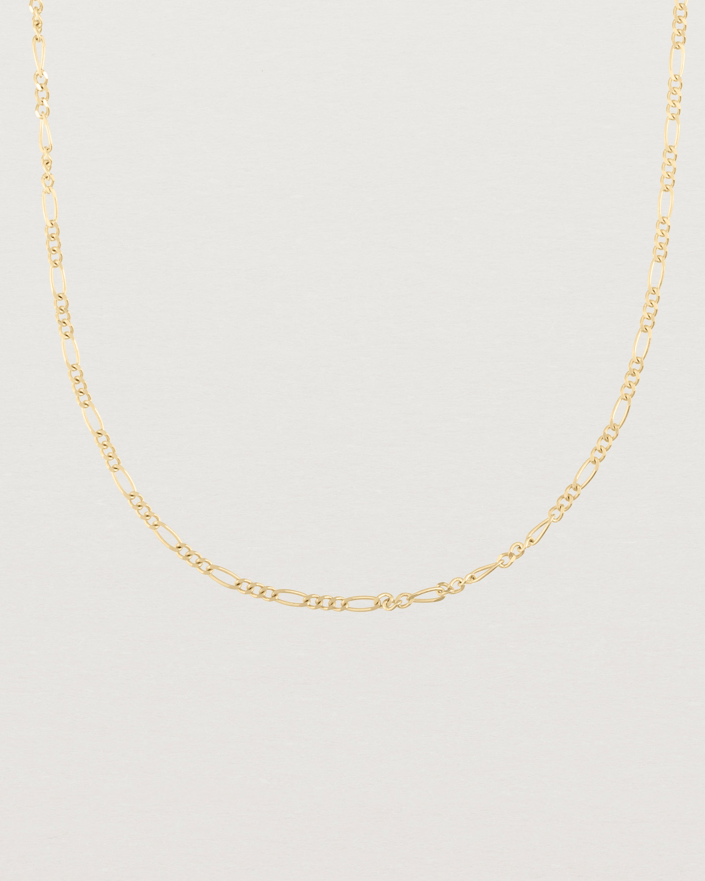 Our fine Figaro chain in yellow gold