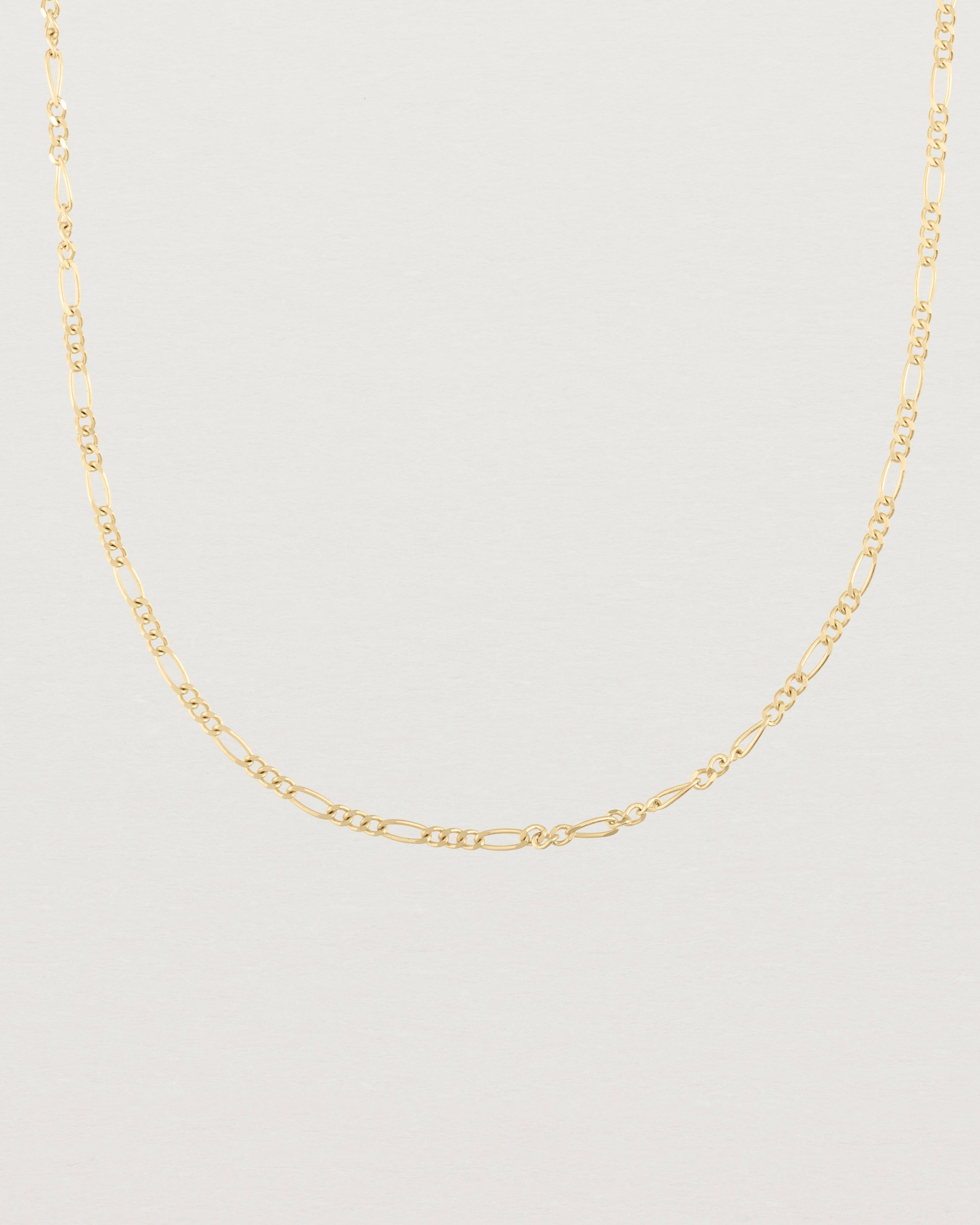 Our fine Figaro chain in yellow gold