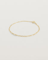 Our signature figaro chain in yellow gold