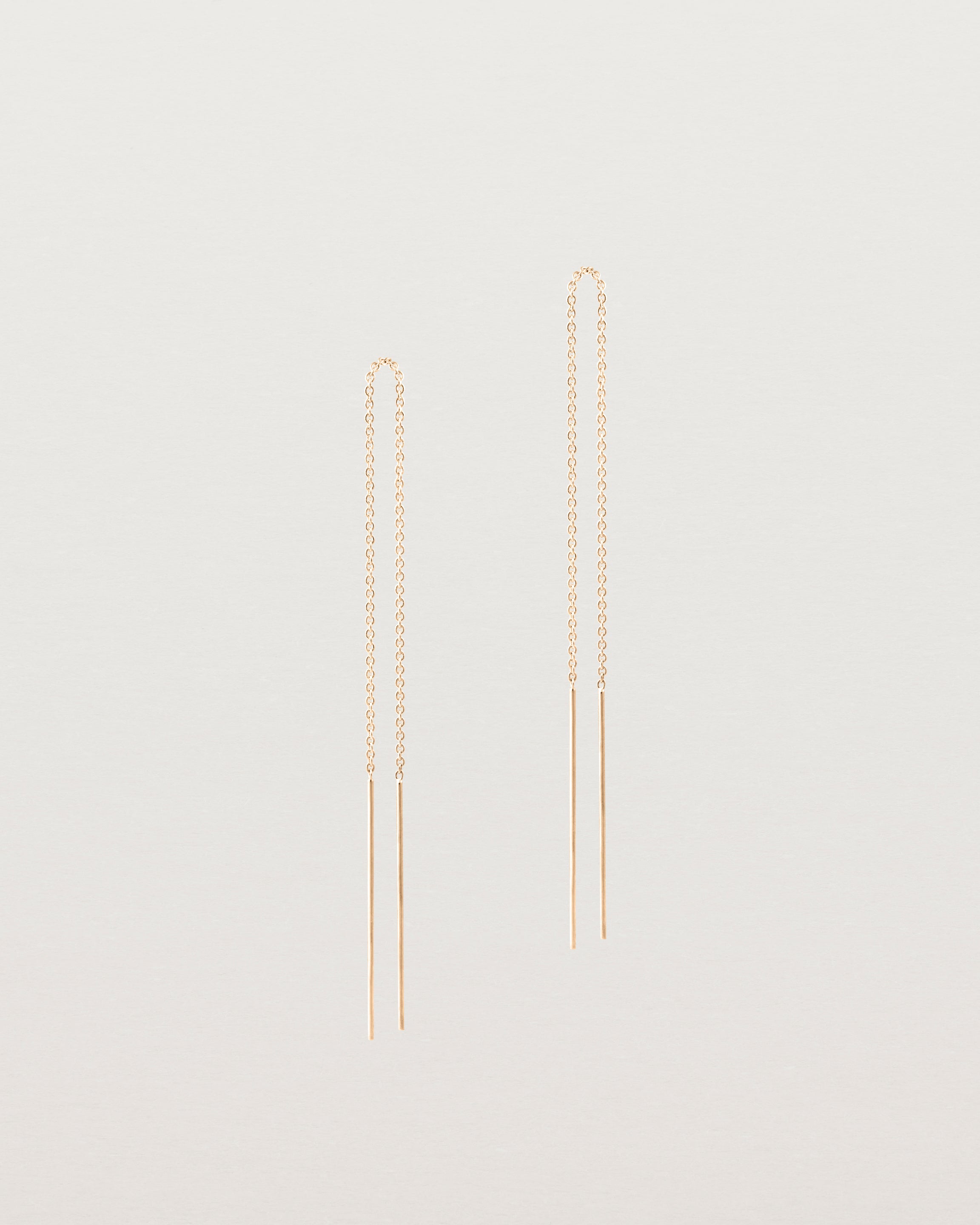Front view of the eve threader earrings in rose gold