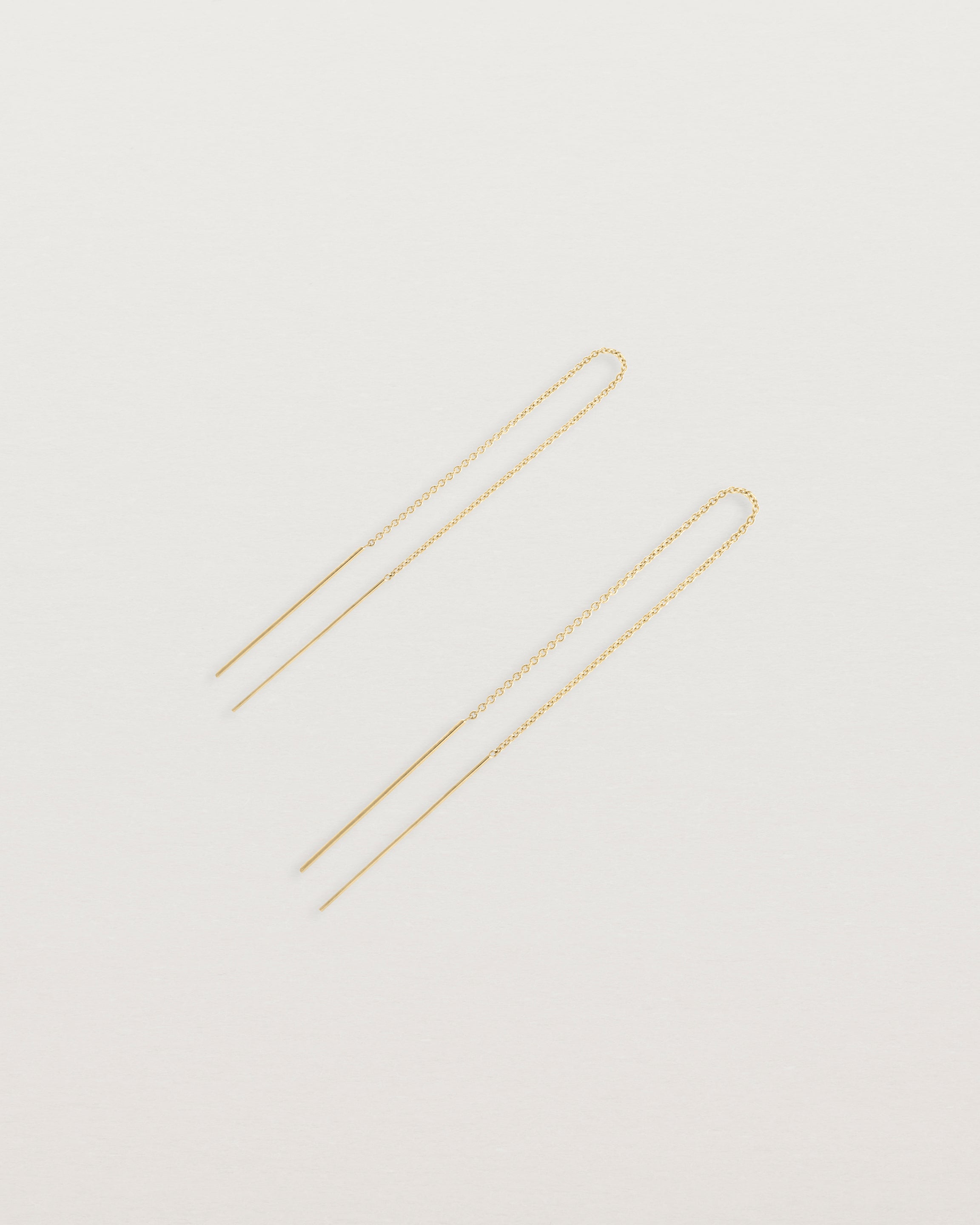 Side view of the eve threader earrings in yellow gold