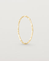 Standing view of the Fine Faceted Stacking Ring | Yellow Gold.