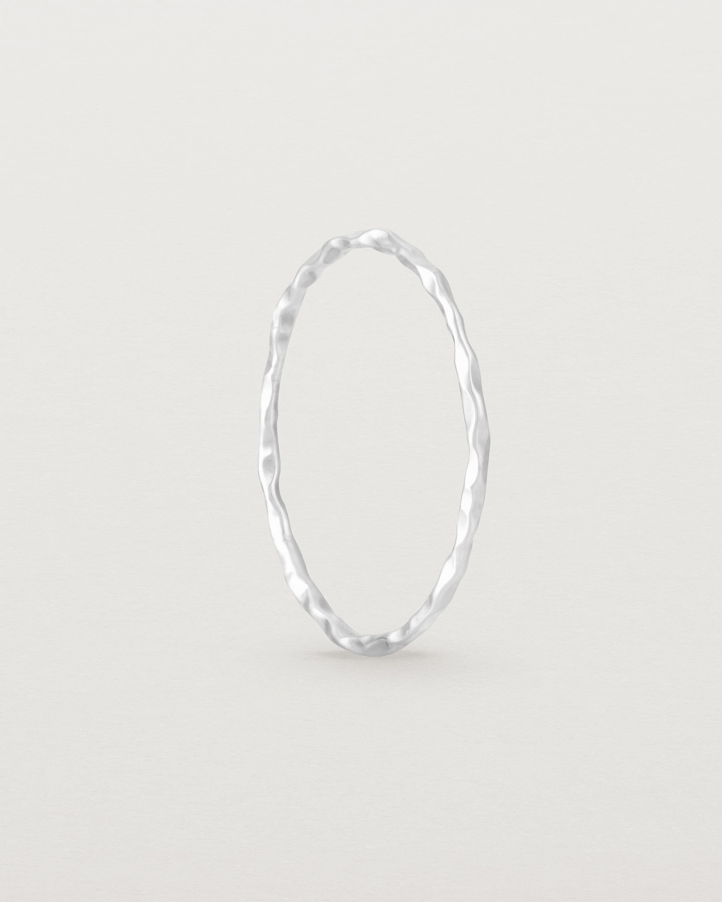Standing view of the Fine Faceted Stacking Ring | Sterling Silver..