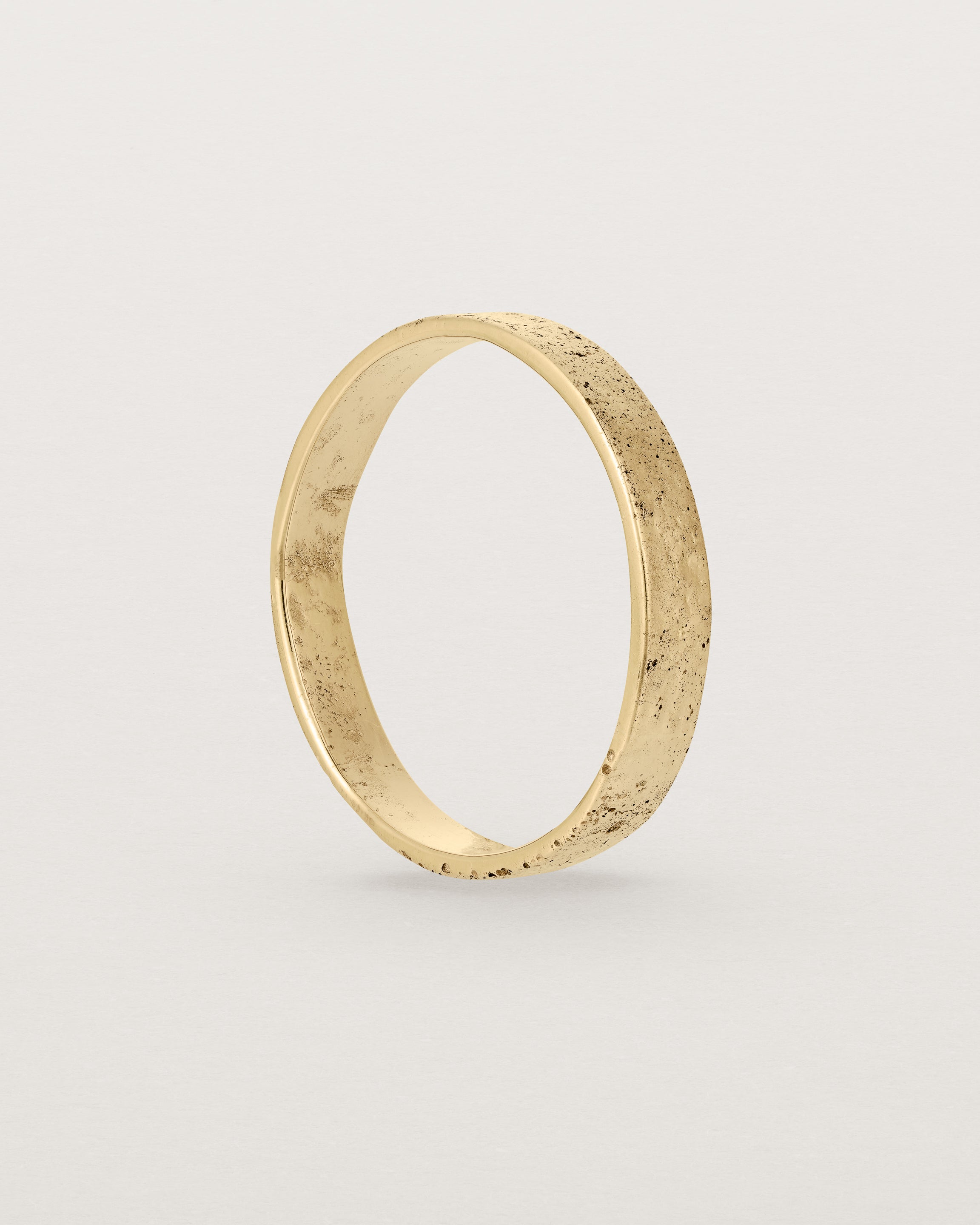 Standing view of  the Naum Stacking Ring | Fine in Yellow Gold.