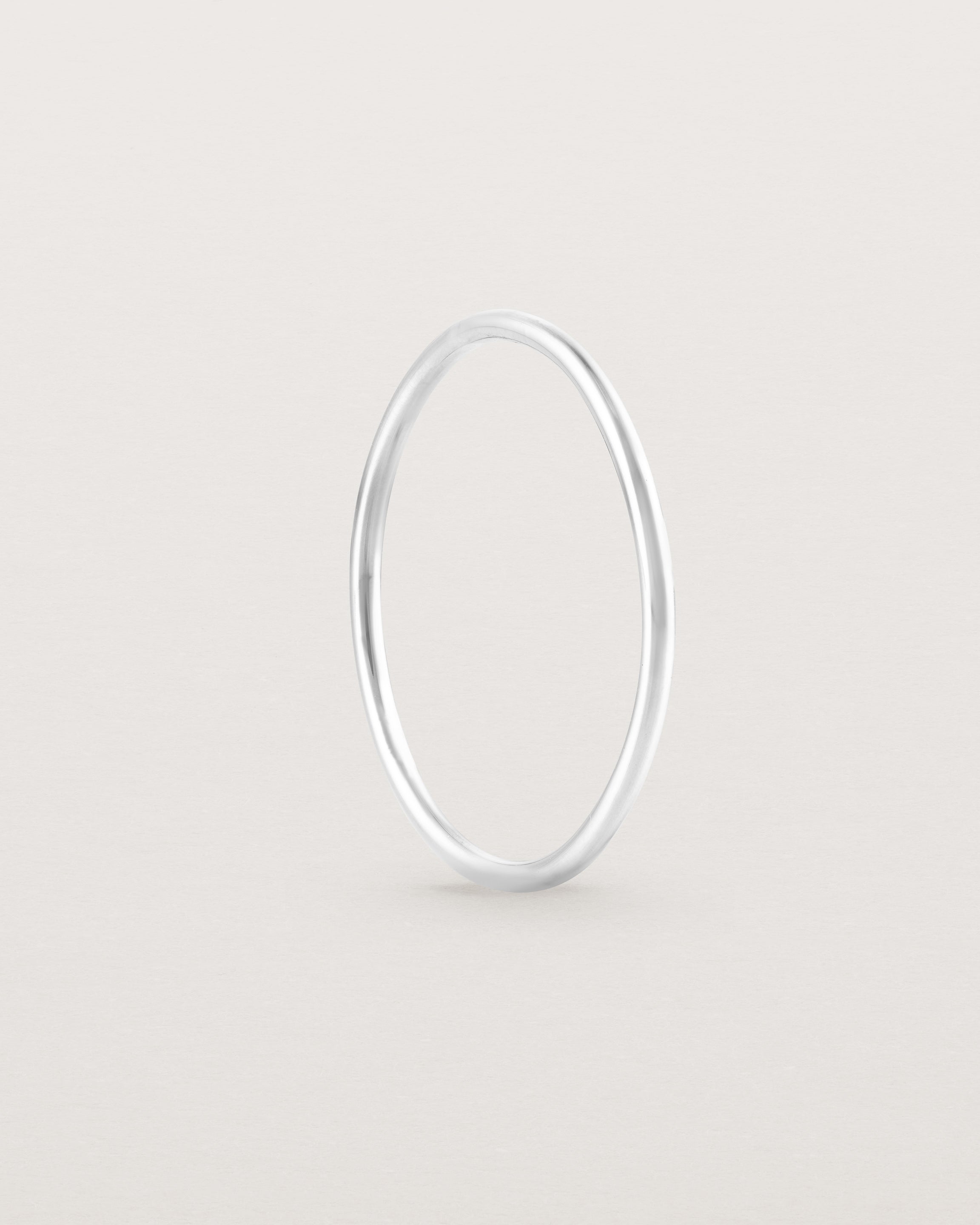Standing view of the Fine Stacking Ring in white gold.