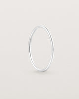 Standing view of the Fine Stacking Ring in white gold.