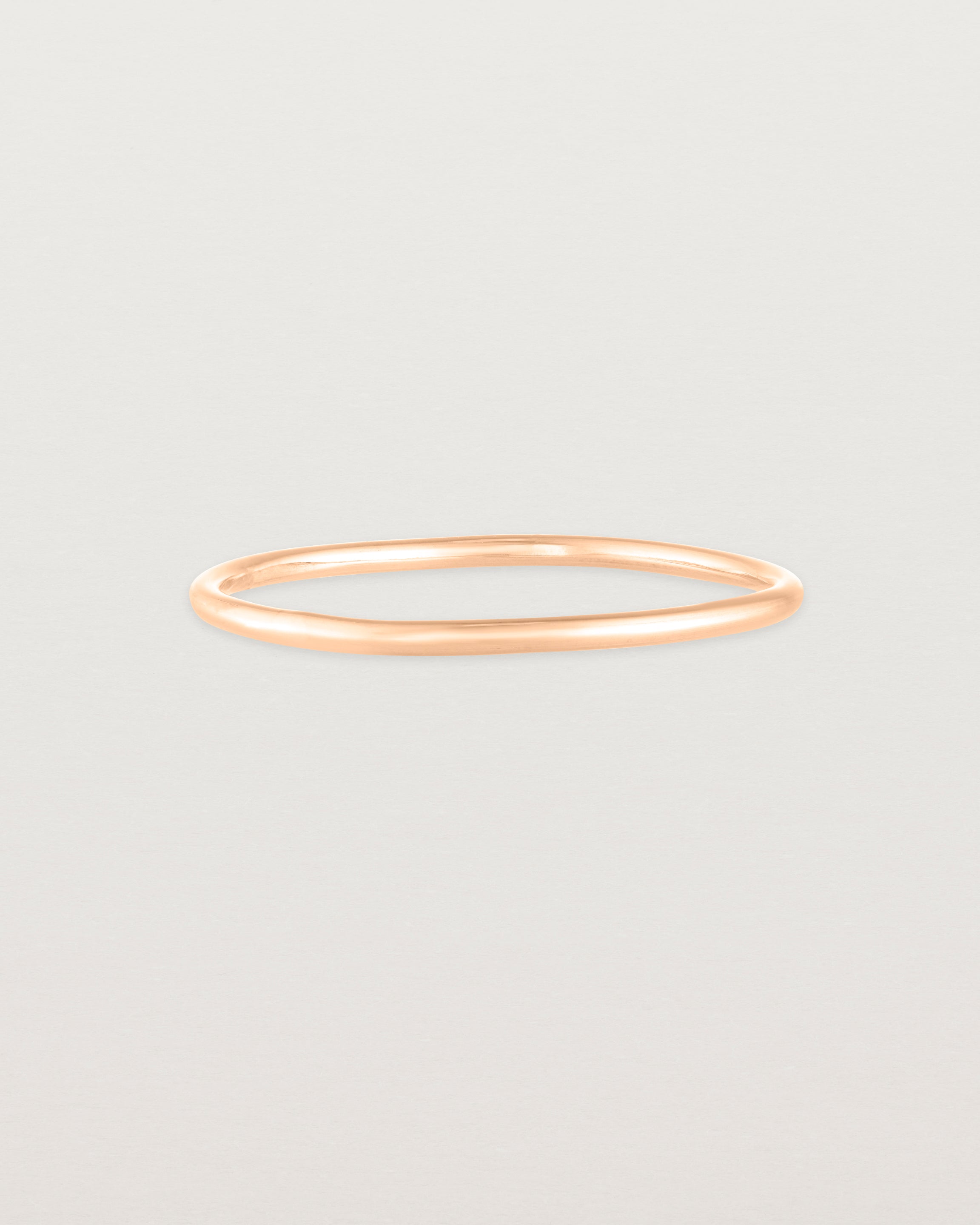 Front view of the Fine Stacking Ring in rose gold.