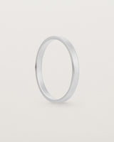 The side profile of our square profile, flat wedding band crafted in sterling silver