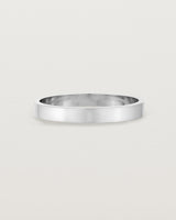 Our square, flat 3mm profile wedding band crafted in sterling silver