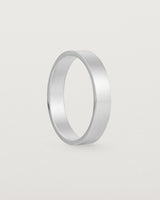 The side profile of our our square, flat 4mm profile wedding band crafted in sterling silver