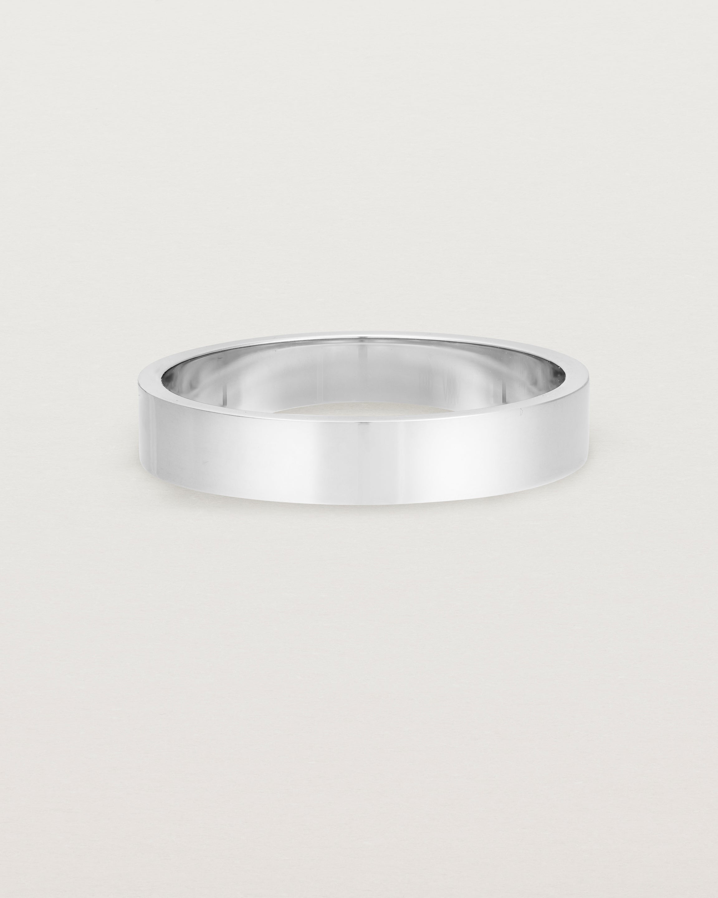 Our square, flat 4mm profile wedding band crafted in sterling silver