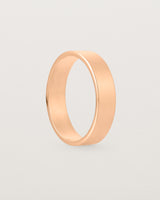 Side profile of our square, flat 5mm profile wedding band crafted in rose gold