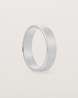 Side profile of our square, flat 5mm profile wedding band crafted in sterling silver