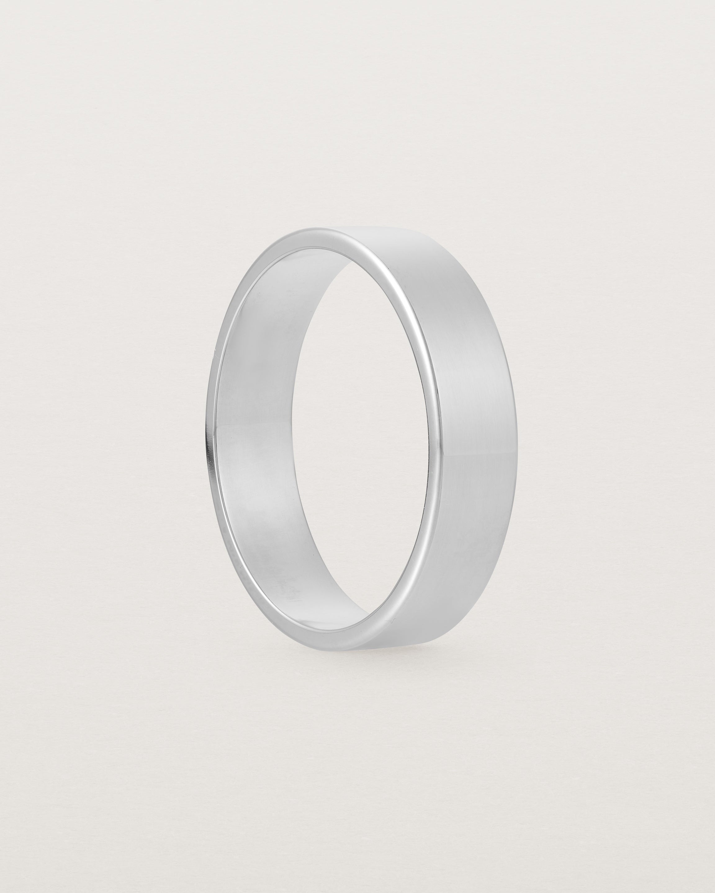 Side profile of our square profile, 5mm flat wedding band, crafted in white gold