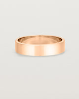 Our square, flat 5mm profile wedding band crafted in rose gold