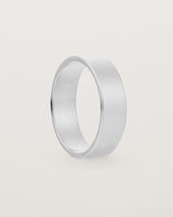 Our square profile, 6mm flat wedding band crafted in white gold