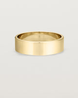 Our square profile, 6mm flat wedding band crafted in yellow gold
