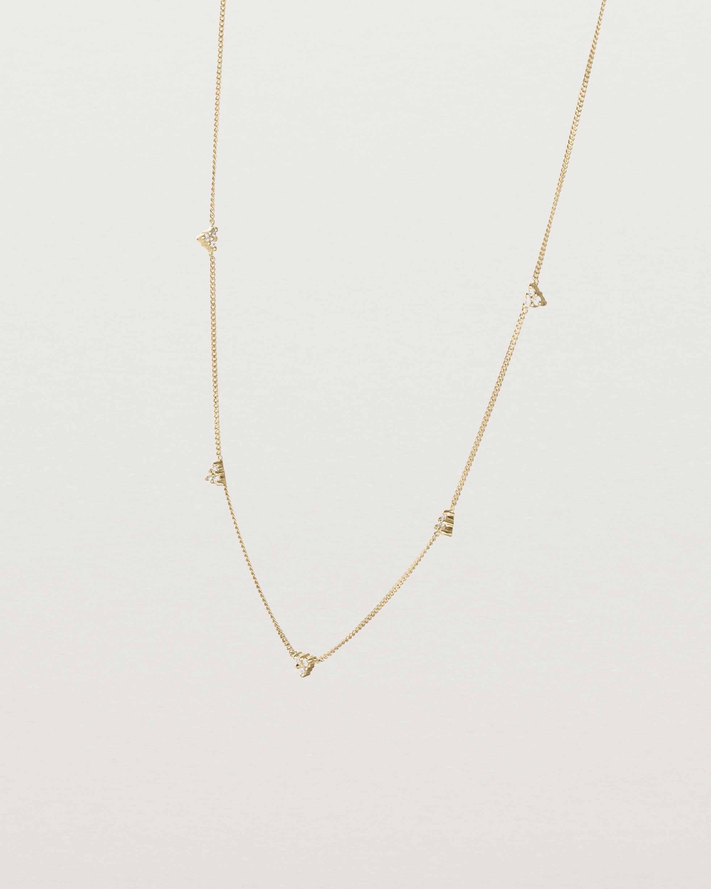 Angled view of the Full Kalani Necklace | Diamonds in yellow gold. 