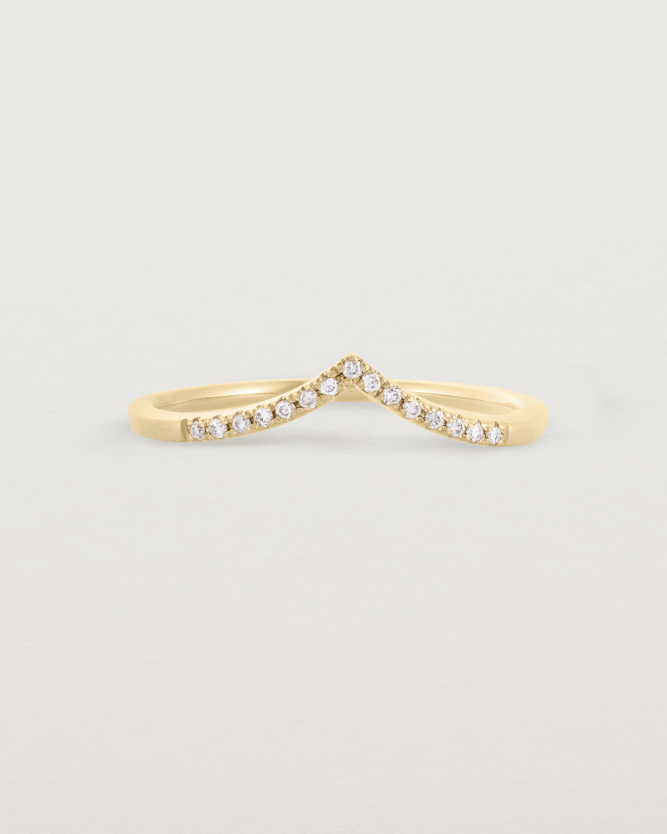 White diamond gentle point ring in yellow gold