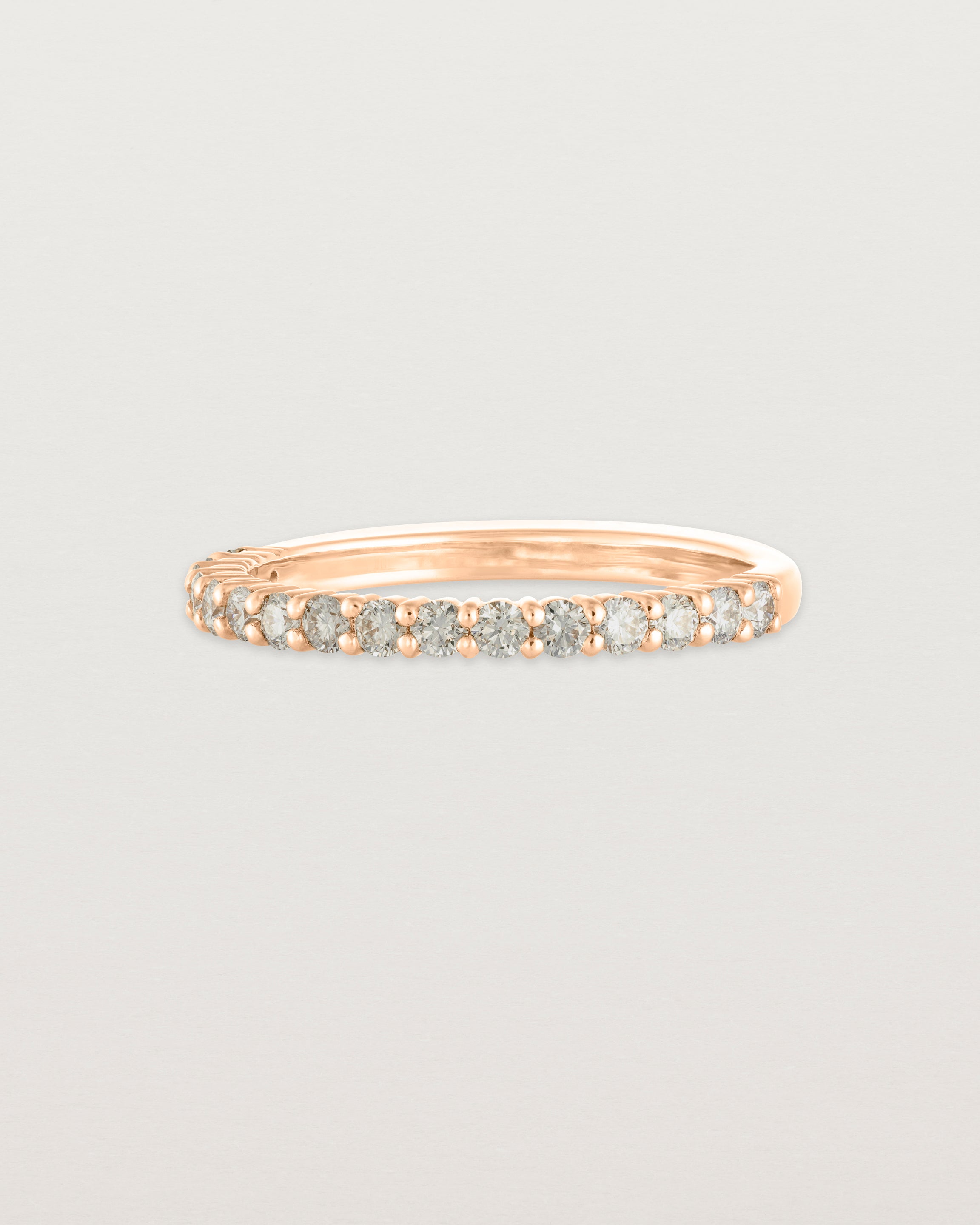 Angled view of the Demi Grace Ring | Champagne Diamonds in rose gold.